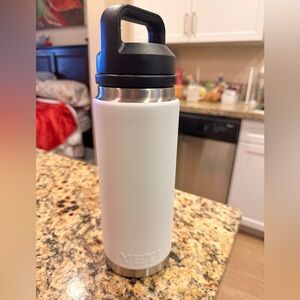 White 26 Oz YETI water bottle.  Used with dent at bottom.